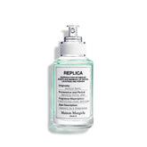 Maison Margiela Replica Baño de Burbujas: botella lista para relajación con burbujas aromáticas.