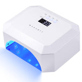 Makartt Aurora lampara UV en uso con uñas gel listas para curar.