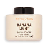 Polvo suelto Makeup Revolution Banana Light, empaque compacto para retoques ligeros.