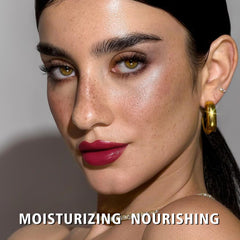 Application close-up shows creamy glide and strong color payoff.