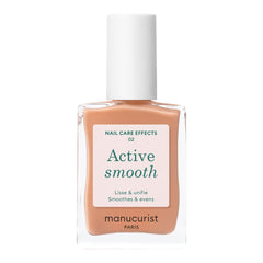 Botella de Manucurist Active Smooth 02 con esmalte nude y dorado suave.