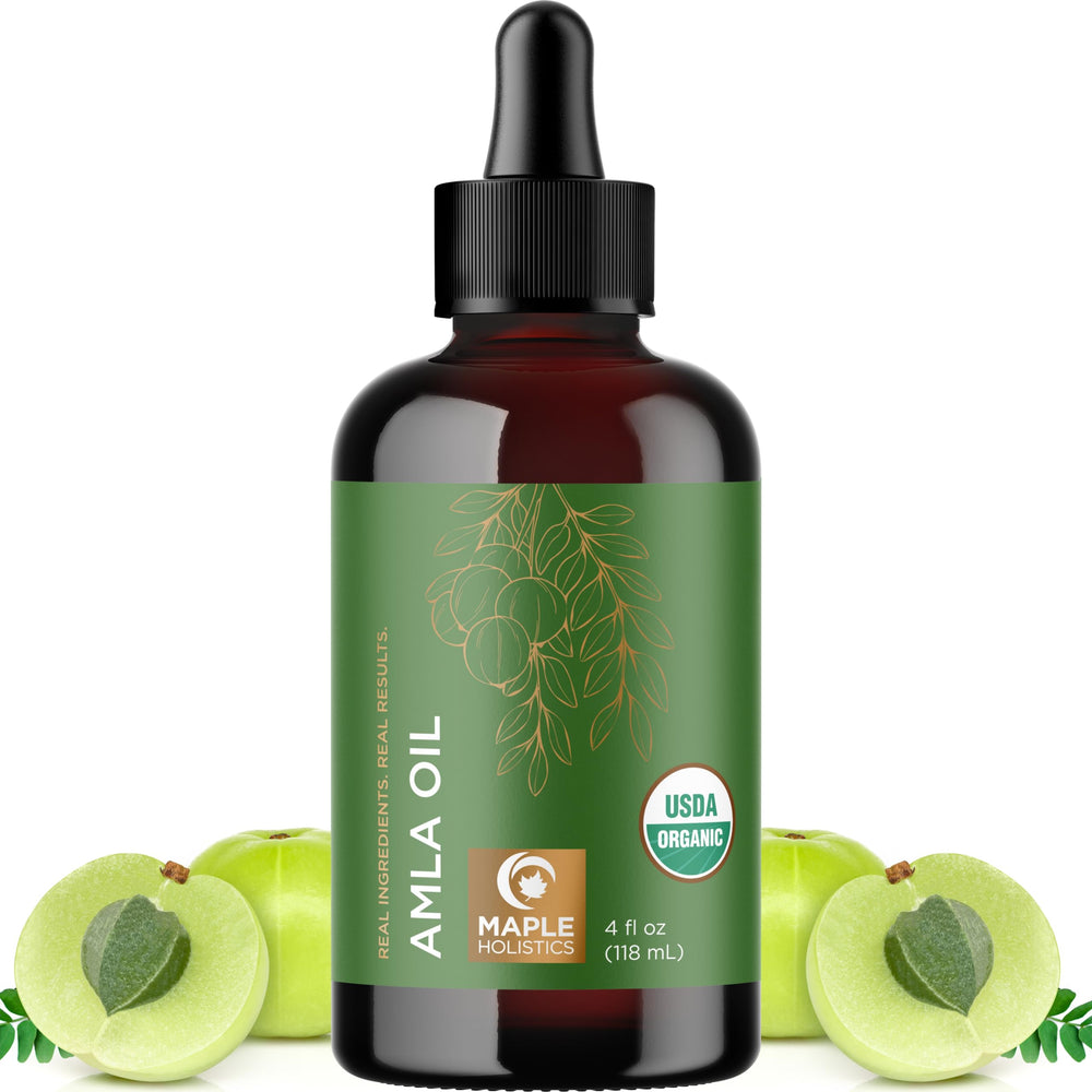 Aceite Amla de Maple Holistics vertido en botella, fácil de aplicar en diario.