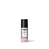 Maria Nila Cream Heat Spray sur la bouteille, protection thermique pendant le coiffage.