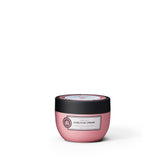 Maria Nila Curlicue Cream sur bouteille, soin léger pour boucles faciles à coiffer.