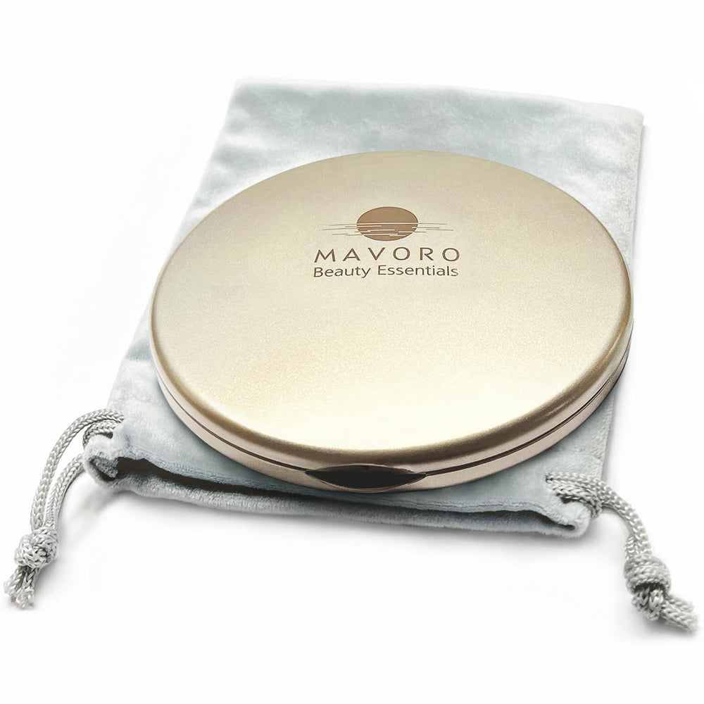 Espejo compacto Mavoro, doble cara para retoques rápidos.