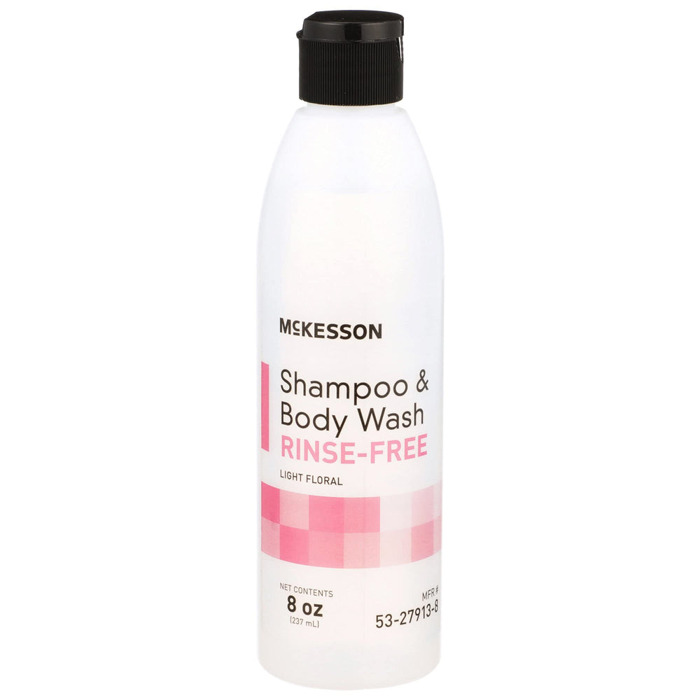 Botella McKesson Shampoo sin agua con fragancia ligera para uso práctico.