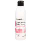 Botella McKesson Shampoo sin agua con fragancia ligera para uso práctico.
