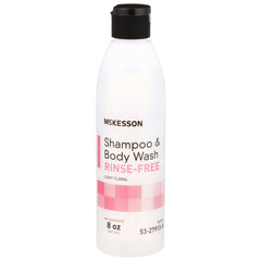 Botella McKesson Shampoo sin agua con fragancia ligera para uso práctico.