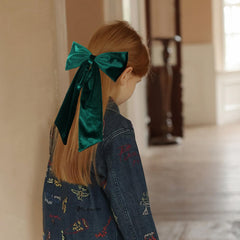 Broche de cabello melyde con lazo de terciopelo verde oscuro, toque festivo.