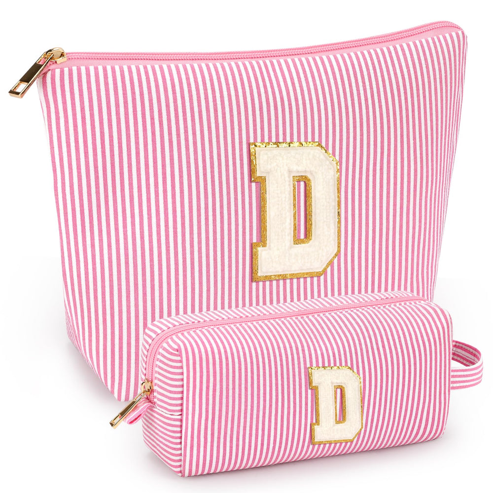 Estuche de maquillaje inicial de mibasies en rosa, ideal para viajar y organizar productos.