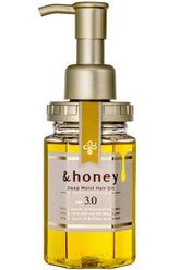 Esta botella de &honey muestra un aceite capilar de hidratación profunda para uso diario.