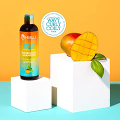 Mielle Organics Mango Tulsi champú cabello rizado: definición y brillo natural.