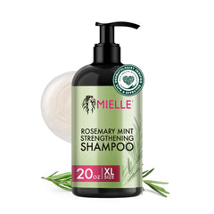 Champú Mielle Organics romero-menta en botella para limpieza suave y revitalización.