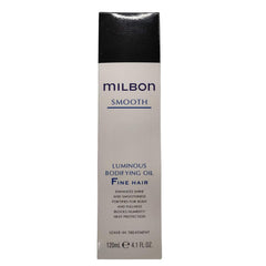 Milbon Aceite Bodificante en mano durante aplicación: controla el encrespamiento y ofrece cuerpo.