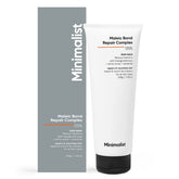 Mascarilla Minimalist en bote para cabello dañado, deja un tacto suave.