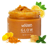 Minimo Glow Turmeric Face Scrub muestra la botella, ideal para exfoliar suavemente y revelar luminosidad.