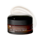 MIZON crema para ojos en bote, cuidado suave para el contorno.