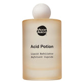 Moon Juice Acid Potion, botella visible, exfoliación suave para una piel más lisa.