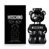 Moschino Toy Boy, botella negra lacada, ideal para noches elegantes.
