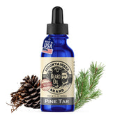 Aceite para barba Mountaineer Brand con aroma a pino para hidratación suave.