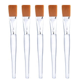 Brocha Mudder para mascarilla facial con cabezal suave y mango transparente.