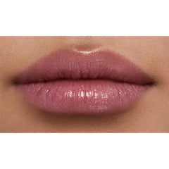 NARS Orgasm Afterglow Lip Balm con brillo dorado para luminosidad instantánea.
