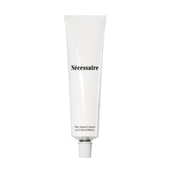 Nécessaire crema de manos: botella visible y hidratación suave para piel seca.
