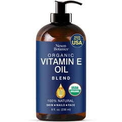 Nexon Botanics Aceite Vitamina E: mezcla orgánica en bote oscuro para cuidado diario de la piel.