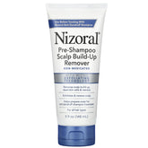 Nizoral pre-shampoo bottle shows exfoliation action to prep the scalp.