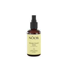 NOOR HAIR Wonder Growth Spray: bouteille élégante prête pour une utilisation quotidienne.
