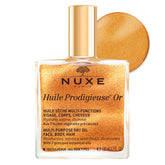 Nuxe Huile Prodigieuse Shimmer en botella muestra brillo perlado para rostro y cuerpo