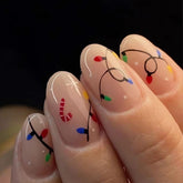 Uñas postizas OCOUYVD Navidad coloridas con luz, look festivo
