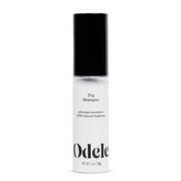 Odele dry shampoo bottle showing root-absorption action for oil control