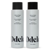 Odele champú de reparación con hidratación en botella, ideal para cabello seco.