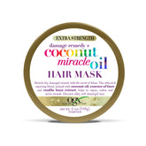 OGX Reparación de Daño: mascarilla coco milagroso en bote de 170 g para hidratación profunda.
