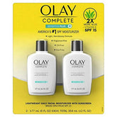 Olay Complete UV Plus hydratant SPF 15 en flacon-pompe, peau sensible hydratée et protégée.