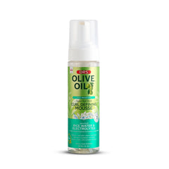 ORS Mousse Definidora para rizos con aceite de oliva mejora la definición.