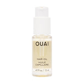 Aceite OUAI para cabello, botella de viaje, aporta brillo y protección.