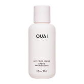 OUAI Anti Frizz Crema de viaje con dosificador para peinados sin frizz