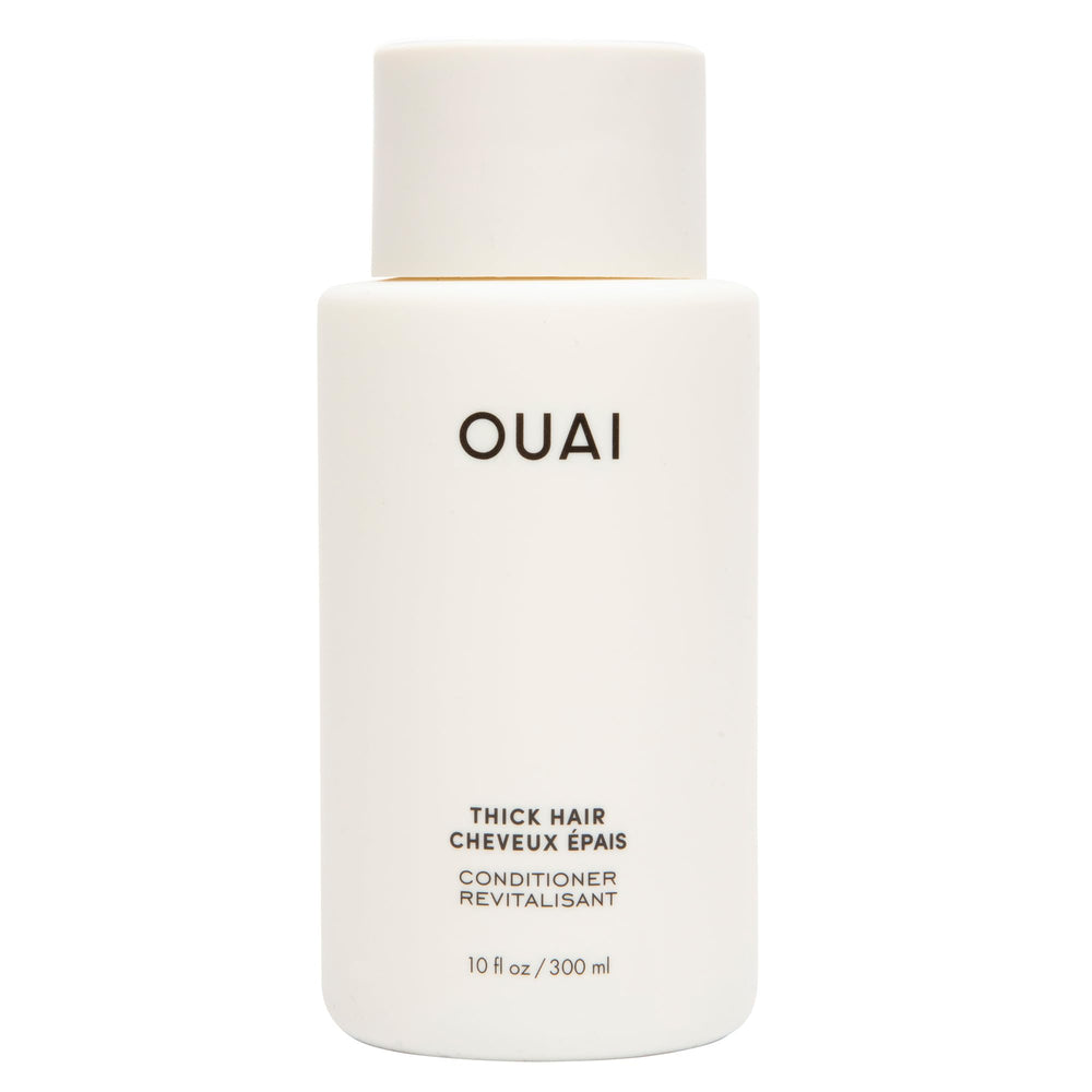 OUAI Condicionador para cabello grueso, bote visible, hidratación profunda.