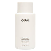 OUAI Condicionador para cabello grueso, bote visible, hidratación profunda.