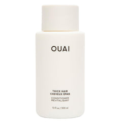 OUAI Condicionador para cabello grueso, bote visible, hidratación profunda.