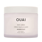 OUAI Melrose Place crema corporal en envase, hidratación duradera para piel seca.