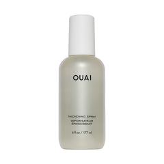 OUAI Thickening Spray en botella para cabello, grosor inmediato desde la raíz.