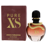Paco Rabanne Pure XS para mujer, frasco dorado de lujo, ideal para eventos nocturnos.