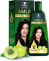 Parachute Advansed Amla: aceite para cabello en botella, facilita aplicación suave.