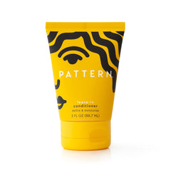 PATTERN Leave-In Conditioner bottle pour showing moisture-rich formula for curls