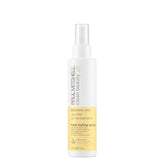 Paul Mitchell Clean Beauty Heat Spray frente a la botella, protección suave y brillo natural.