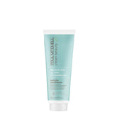 Paul Mitchell Clean Beauty Hydrate: botella frontal, cabello seco hidratado y manejable.