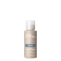 Paul Mitchell Acondicionador, vertido de la botella, hidrata y deja el cabello suave.